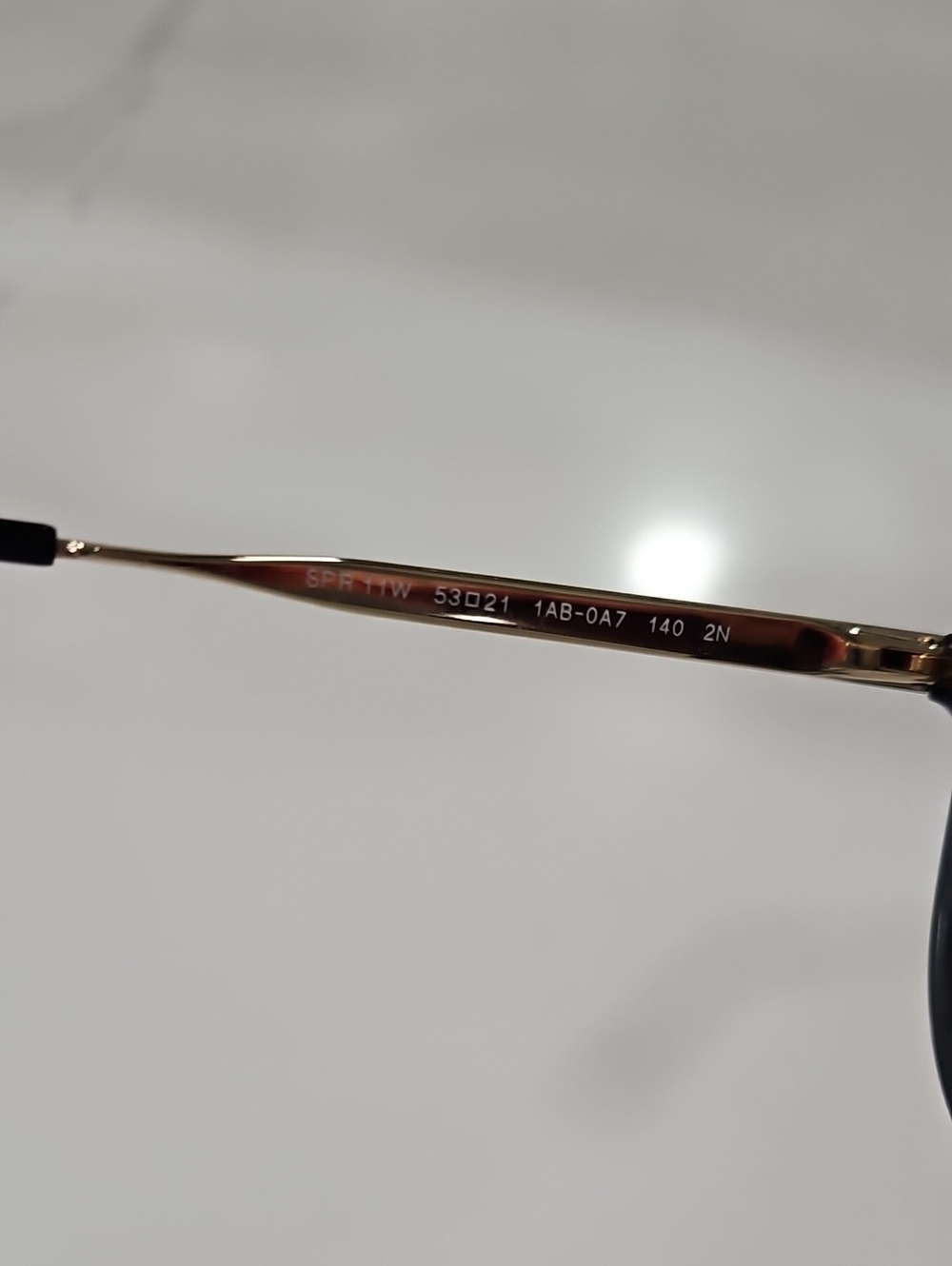 Prada Black and Gold Sunglasses - Picture 9 of 10